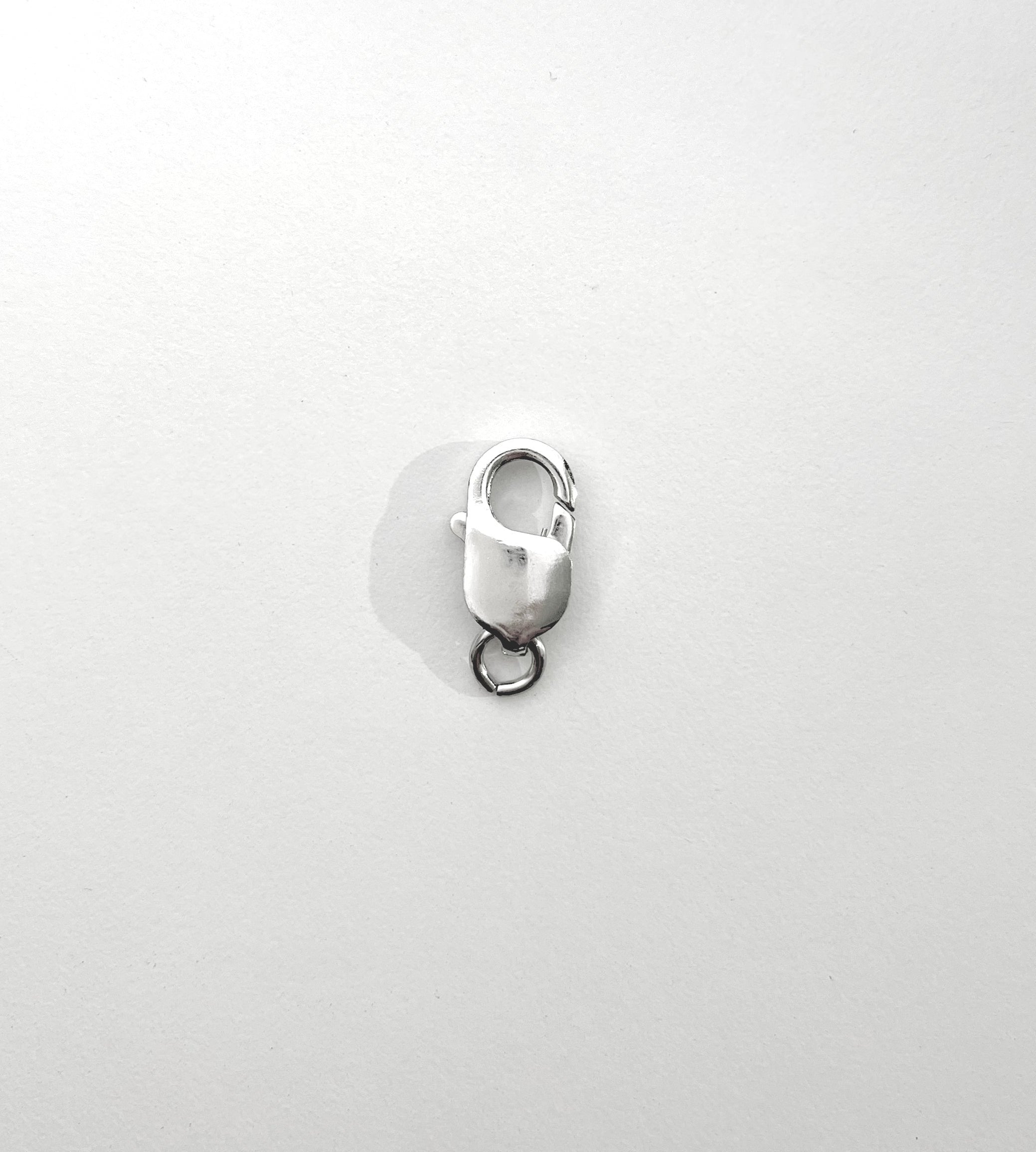 <p>lobster lock replacement clasp for medium to large chains. this classic lobster lock clasp closure is made with sterling silver 925 with a rhodium plated finish. this clasp features a strong 6mm open ring for easy use.â </p> sterling silver 925 - product image