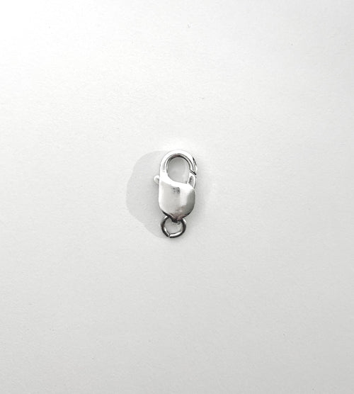 <p>lobster lock replacement clasp for medium to large chains. this classic lobster lock clasp closure is made with sterling silver 925 with a rhodium plated finish. this clasp features a strong 6mm open ring for easy use.â </p> sterling silver 925 - product image