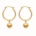 <style type="text/css"><!--td {border: 1px solid #cccccc;}br {mso-data-placement:same-cell;}--></style>
<p><span data-sheets-root="1">embrace timeless elegance with the 14k real yellow gold heart dangle hoop earrings. these exquisite earrings showcase a luxurious heart-shaped design, crafted from high-quality 14k yellow gold. the combination of classic gold hoops with a romantic heart dangle creates a piece that is both stylish and sophisticated.<br><br>designed for those who appreciate premium craftsmanshi