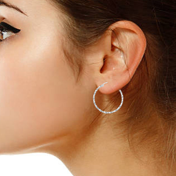 Ritastephens Sterling Silver Tubular Twist High Polished Round Click-Top Hoop Earrings